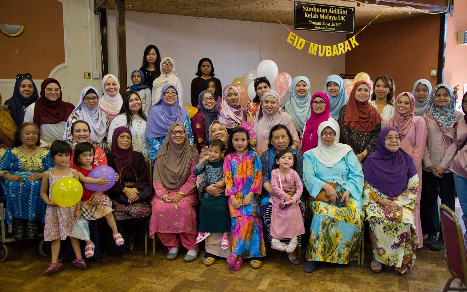 MAUK community members gathered outdoors for an event